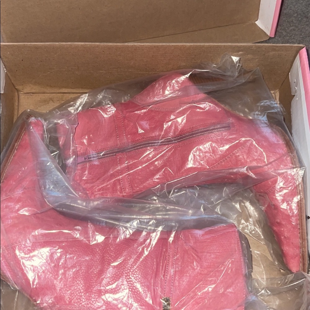 Pink ostrich heeled boots
